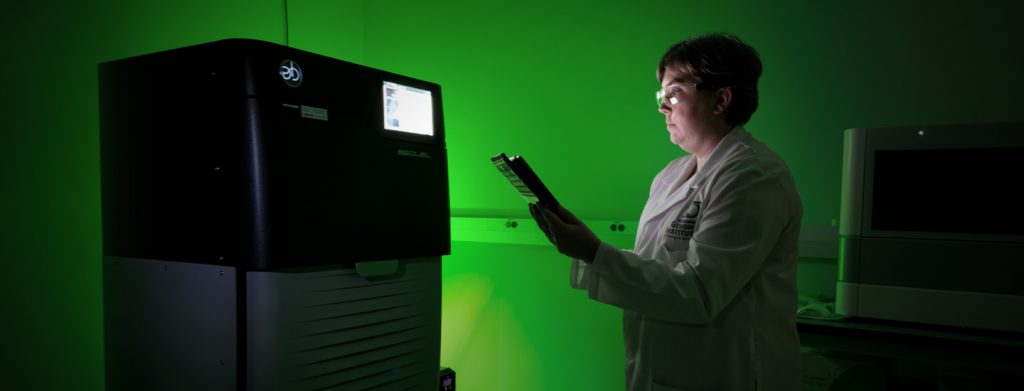 Woman at PacBio sequencer